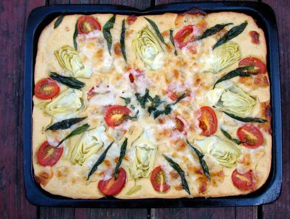 chickpea flour cake baked with tarragon and artichoke hearts