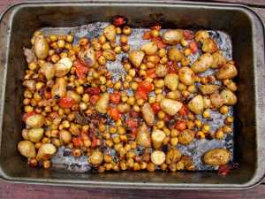 Roasted chickpeas, potatoes and tomatoes with sage and rosemary