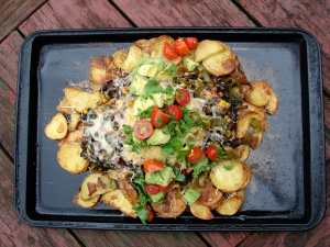 Thin crispy potatoes with chipotle black beans and guacamole
