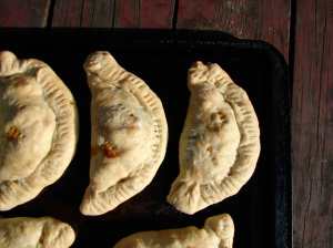 Spring empanadas with asparagus arugula and white beans