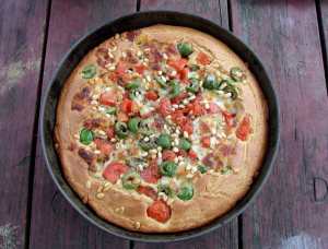 Savory cake with olives, tomatoes and mozzarella