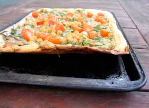 Pizza with tarragon pumpkinseed pesto