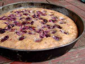 Almond cake with chocolate and cherries