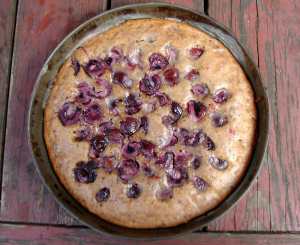 Almond cake with chocolate and cherries