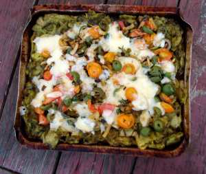 Pesto potato pie with fennel, tomatoes and olives