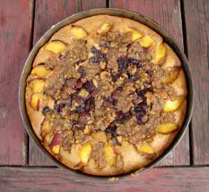 pistachio crumb cake with cherries, peaches and chocolate