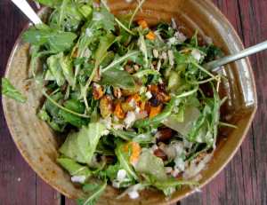 Arugula salad with roasted carrots, beets and pecans