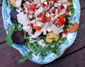 Roasted beets and sweet potatoes with fresh tomatoes and mozzarella