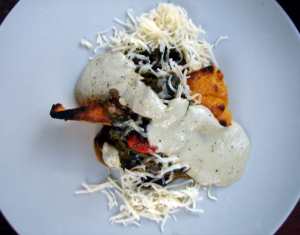 Polenta, chard, black beans and pepito sauce