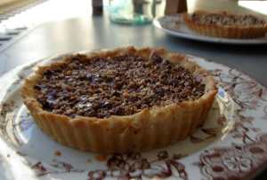 Blackberry, pear and hazelnut tart