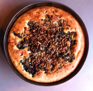 Savory cake with chard, roasted mushrooms, pecans and pistachios