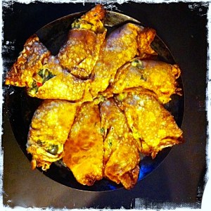 Crepes with chard, olives, and tarragon almond "ricotta"