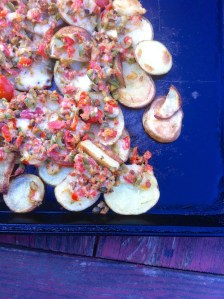 Potatoes with goat cheese, olives and capers