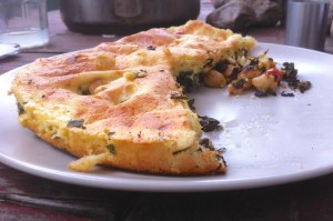 Savory pancake with chickpeas, tomatoes and chard