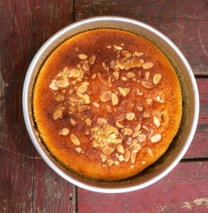 Almond cake with cherries, black currants and bittersweet chocolate