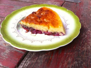 Almond cake with blackcurrants, cherries and bittersweet chocolate