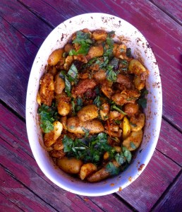 Smoky spicy potatoes with olives capers and artichoke hearts